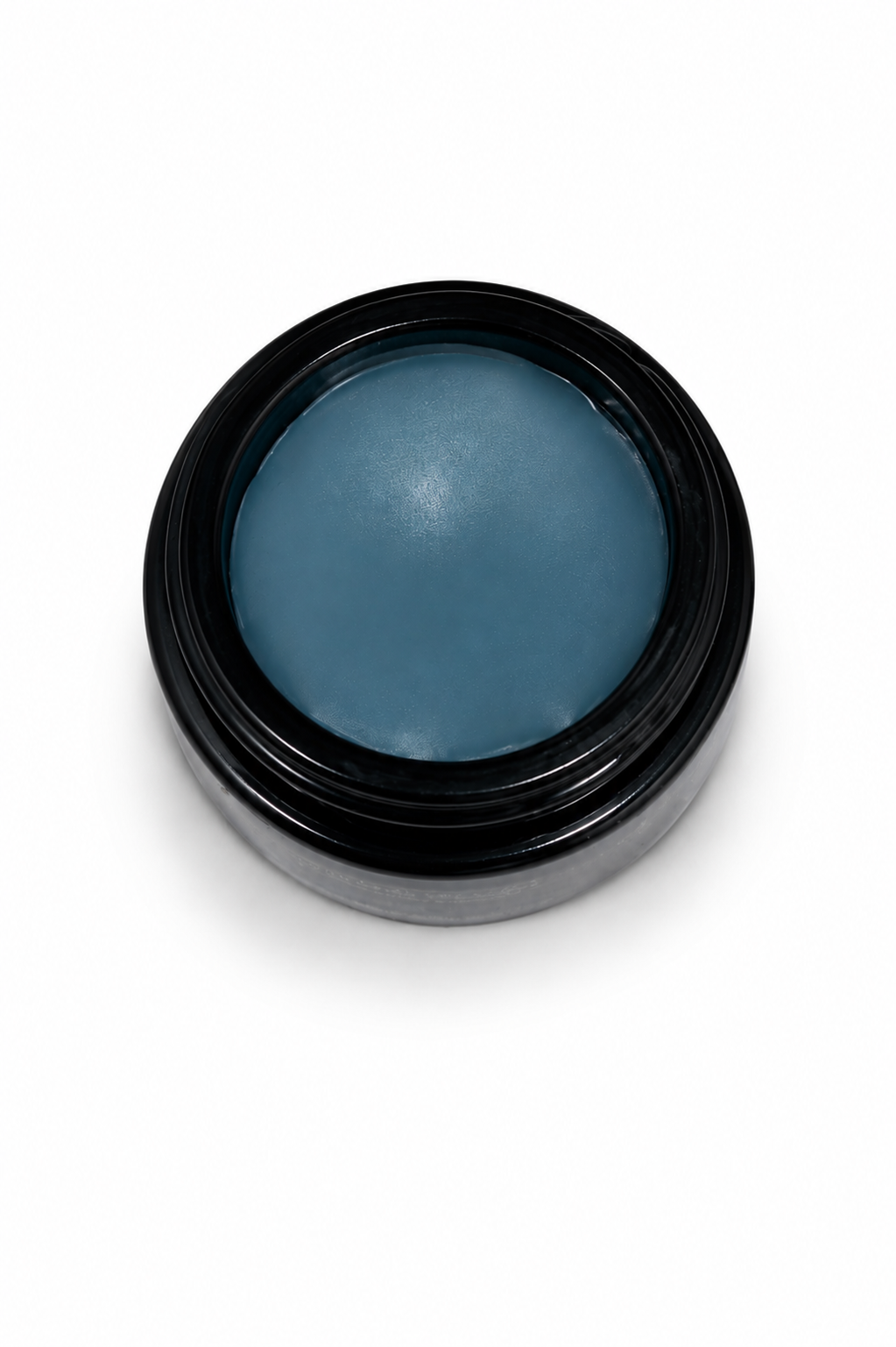 Jar of blue cream on a white background